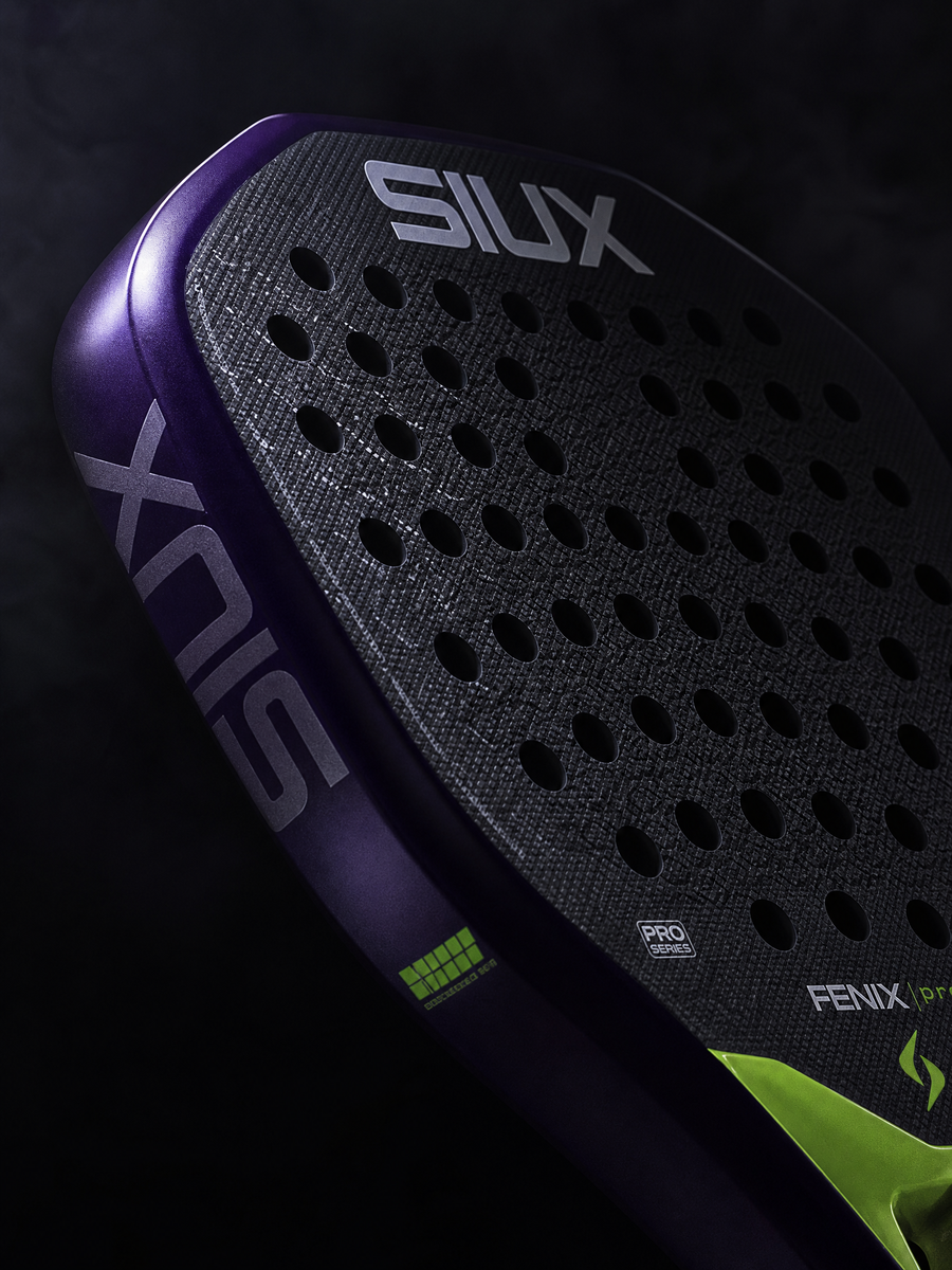 Close-up of a purple and black sports equipment with 'Silux' branding on a dark background.
